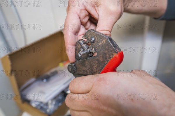 Close-up of pliers in use doing fine engineering work