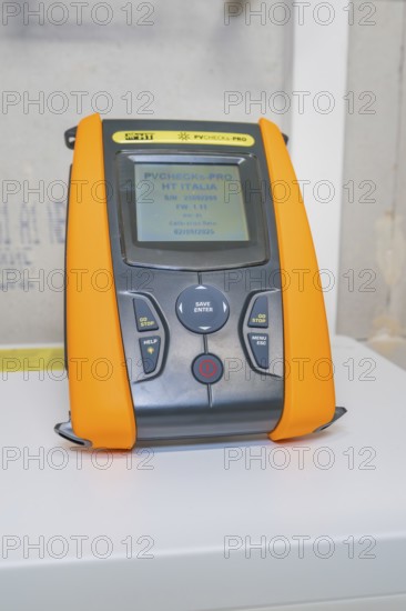 PVcheck PRO electronic measuring device device with orange elements on the surface