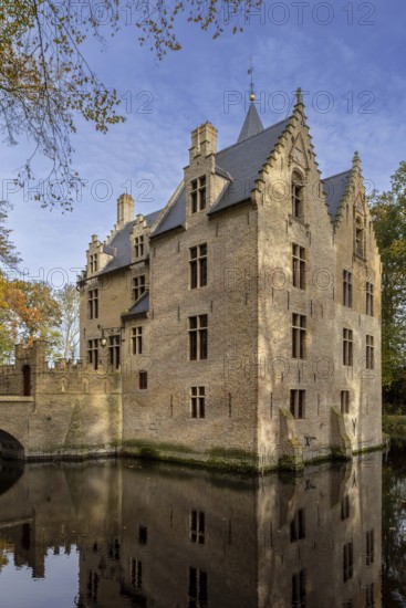 Kasteel Beauvoorde, 17th century moated castle in Renaissance style in the village Wulveringem in autumn, fall, Veurne, West Flanders, Belgium