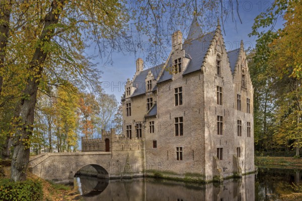 Kasteel Beauvoorde, 17th century moated castle in Renaissance style in the village Wulveringem in autumn, fall, Veurne, West Flanders, Belgium