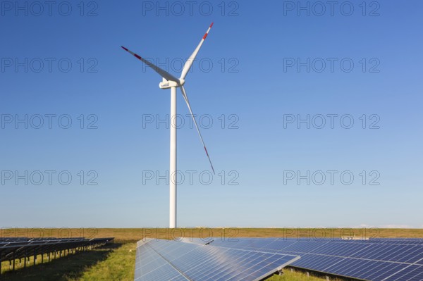 Hybrid power plant combing solar photovoltaic modules and wind turbines, North Frisia, Schleswig-Holstein, Germany