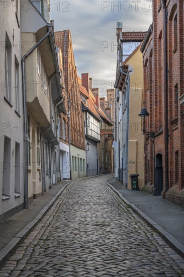 Alley of Lübeck's old town with historic residential buildings, Seventh Querstraße, Hanseatic City of Lübeck, Schleswig-Holstein, Germany
