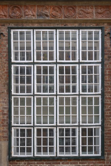 Historic windows, top with terracotta decoration, Renaissance façade, around 1560, Mengstraße 27, Hanseatic City of Lübeck, Schleswig-Holstein, Germany