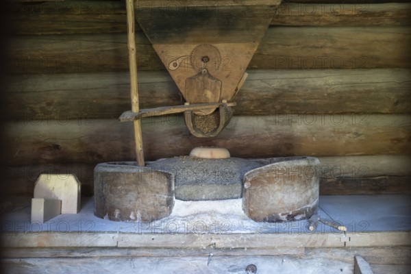 Millstone for making flour, Bjørnstad, farm from Vågå, Maihaugen open-air museum with houses and objects from farms in Gudbrandsdal, Lillehammer on Lake Mjøsa, Innlandet Municipality, Norway