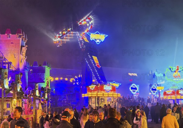 Many people at the All Saints Fair at night, the biggest old town fair in Europe, Soest, North Rhine-Westphalia, Germany