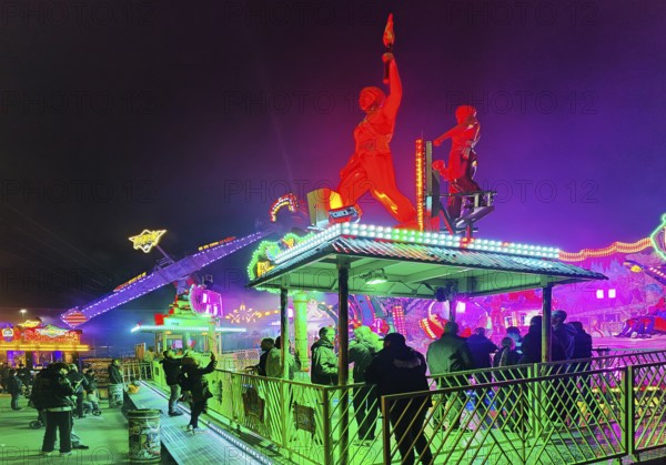 Colourfully illuminated All Saints Fair at night, the largest old town fair in Europe, Soest, North Rhine-Westphalia, Germany