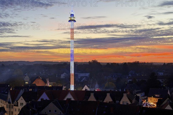 View from above from the Ferris wheel of the free fall tower at the All Saints Fair in the evening, Altstadt, Soest, North Rhine-Westphalia, Germany
