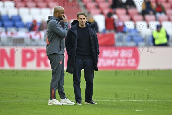 Coach coach Vincent Kompany FC Bayern Munich FCB talking to sports director Christoph Freund FC Bayern Munich FCB Allianz Arena, Munich, Bayern, Germany