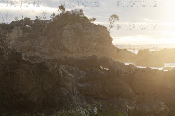 Sunset at Fisherman's Lookout. Dramatic waves and coastal scenery at The Pass, New South Wales, Australia