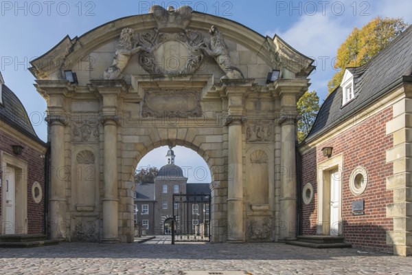 Baroque and moated castle Ahaus, magnificent portal, today the seat of the Ahaus Technical Academy, Ahaus, Münsterland, North Rhine-Westphalia, Germany