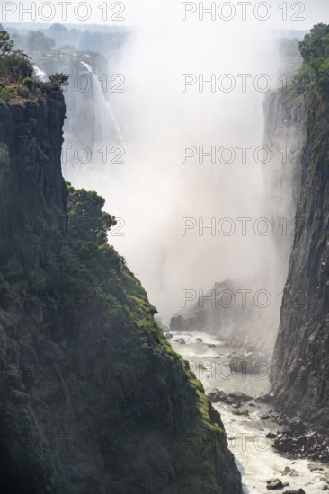 Water plunges into the depths, Victoria Falls with gorge, Zambezi, Zimbabwe