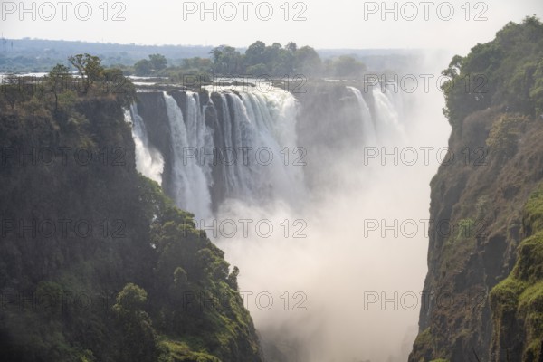 Water plunges into the depths, Victoria Falls with gorge, Zambezi, Zimbabwe