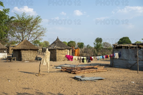Typical village with mud huts, locals, Caprivi strip, Namibia