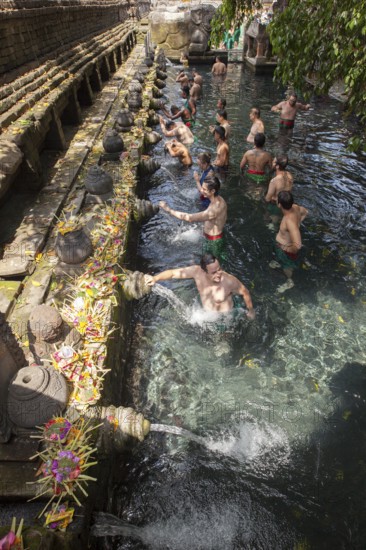 Bathers in Tirta Empul Hot Springs, Bali, Indonesia