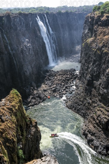 Water plunges into the depths, Victoria Falls with gorge, Zambezi, Zimbabwe