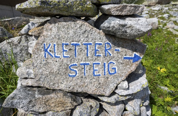 Guide with the inscription via ferrata on rocks, Bergseehütte, Göscheneralp, Canton of Uri, Switzerland