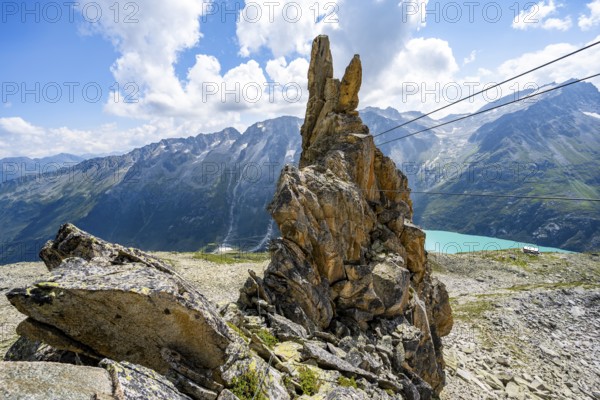 Crocodile rock formation, rope bridge in the Crocodile Mountain Lake via ferrata on Bergseeschijen-Vorbau, Göscheneralp, Canton of Uri, Switzerland
