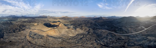 Panorama, Volcán de Las Nueces volcano, picturesque volcanic landscape with volcanic craters at sunrise, Los Volcanes Natural Park, aerial view, Lanzarote, Canary Islands, Spain