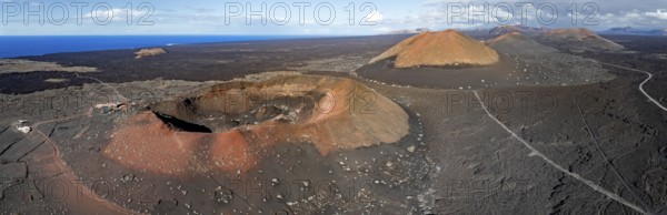 Montaña Quemada and Montaña Pedro Perico volcanoes, volcanic landscape with craters and lava fields, aerial view, Lanzarote, Canary Islands, Spain