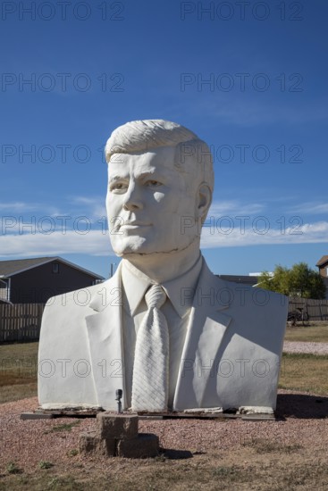 Hermosa, South Dakota - The 20-foot-tall head of President John Kennedy, crafted by artist David Adickes. This was one of 43 Presidential heads made for Presidents Park, near Mt. Rushmore. Presidents Park went out of business a few years after opening in 2003