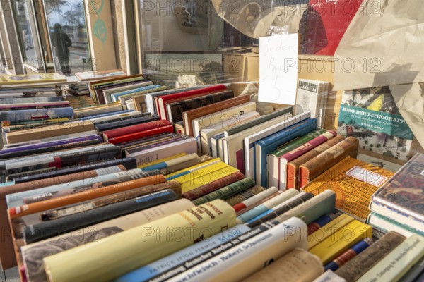 Table with partly old books, offered by a second-hand bookshop