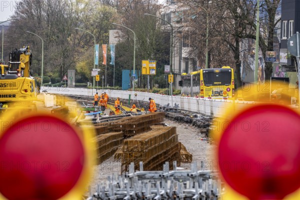 Large-scale construction site in the city center of Essen, Herkulesstraße, the construction of new tracks for the new Stadtbahn-Essen, a new tram line in the city center that will connect the west of the city with the new Essen-51 district, North Rhine-Westphalia, Germany