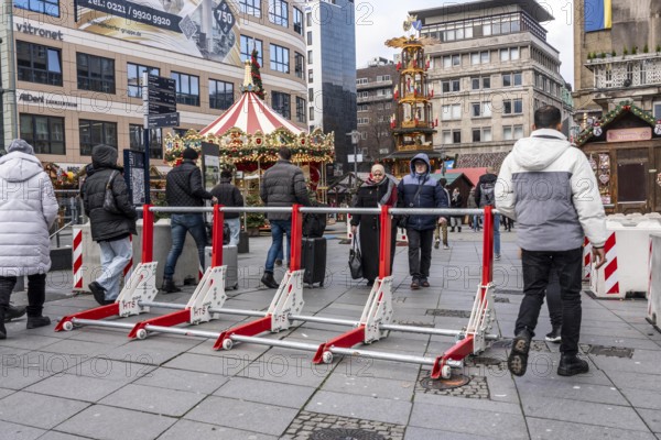 Christmas market in Essen, secured by a mobile anti-terrorist lock, modular, movable barrier against car and truck shooting, are opened or closed by a security guard as required, model Herner Truck Lock, HTS, on Willy-Brandt-Platz, in Essen, North Rhine-Westphalia, Germany