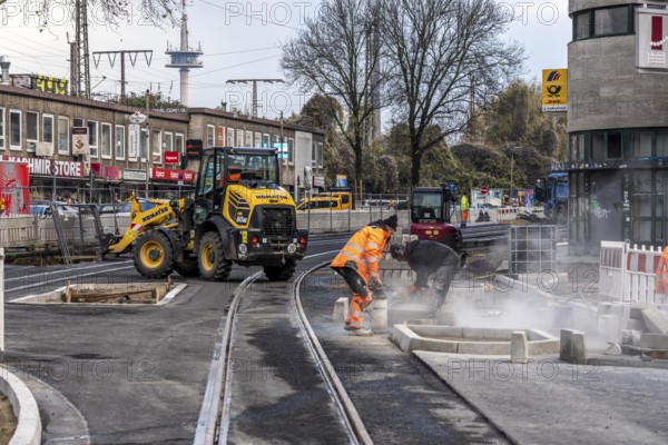 Large construction site in the city center of Essen, Hachestraße am Hauptbahnhof, the construction of new tracks for the new Stadtbahn-Essen, a new tram line in the city center that will connect the west of the city with the new Essen-51 district, North Rhine-Westphalia, Germany