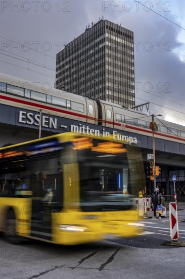 Ruhrbahn bus leaves the bus station at Essen main station, ICE train on track 1 in the train station, Essen, North Rhine-Westphalia, Germany