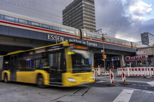 Ruhrbahn bus leaves the bus station at Essen main station, ICE train on track 1 in the train station, Essen, North Rhine-Westphalia, Germany