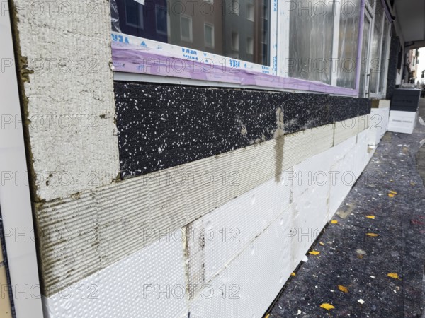 A façade is being renovated with insulation boards and new windows, Wuppertal, Germany