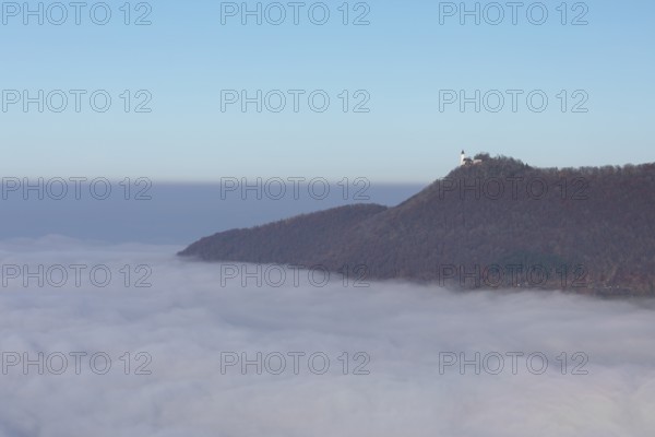 Teck Castle in the magical sea of fog in autumn Swabian Jura Germany