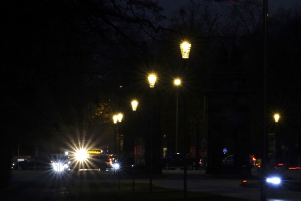 Street at night with lights in a city, November, Germany