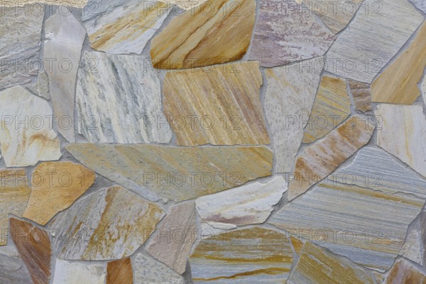 Natural stone with different grain, wall background, allover pattern, structure, Germany