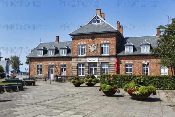 Rønne H, former main train station, café and hotel, historic brick architecture with coat of arms, Rønne, Rönne, Bornholm, Denmark