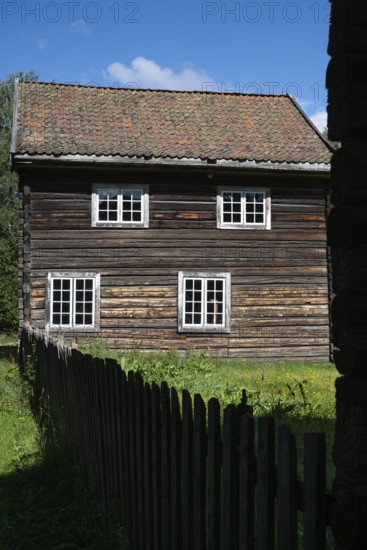 Wooden house on a historic farm, Maihaugen open-air museum with houses and objects from farms in Gudbrandsdal, Lillehammer on Lake Mjøsa, Innlandet Municipality, Norway