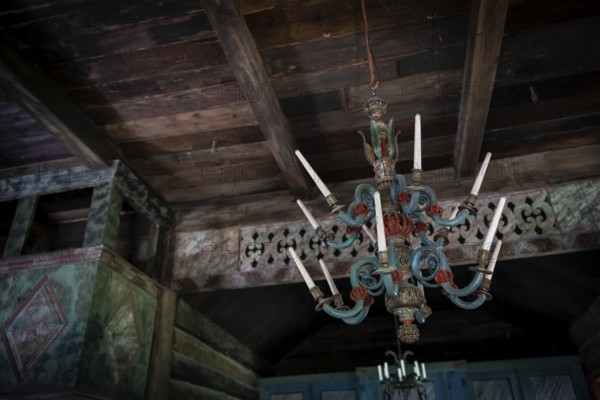 Old chandelier carved from wood, Maihaugen open-air museum with houses and objects from farms in Gudbrandsdal, Lillehammer am Mjøsa Lake, Innlandet County, Norway