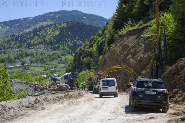 Road construction in mountainous area surrounded by forest and nature, road construction on the way to the Goderdzi Pass near Paksadzeebi, Ajara region, Ajara, Autonomous Republic, Georgia