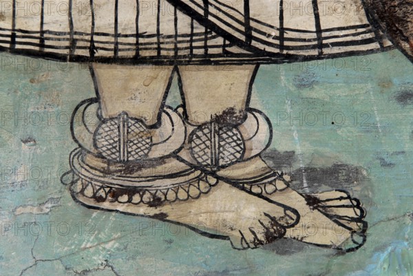 Feet with large traditional silver foot decoration, frescoes, Devigarh Palace Hotel, near Udaipur, Rajasthan, India