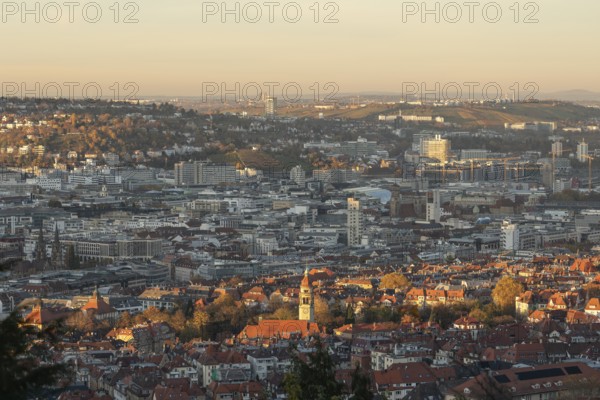View of the city center in warm sunset light from Santiago de Chile Platz Stuttgart, Germany