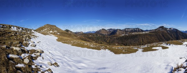 Snowfield on the Trattberg Alm with a view of the Osterhorn Group, Salzkammergut, Salzburg, Austria