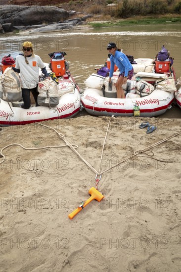 Loma, Colorado - An anchor holds rafts on the shore of the Colorado River during a river rafting tip through Ruby Canyon and Westwater Canyon. The trip was run by Holiday River Expeditions
