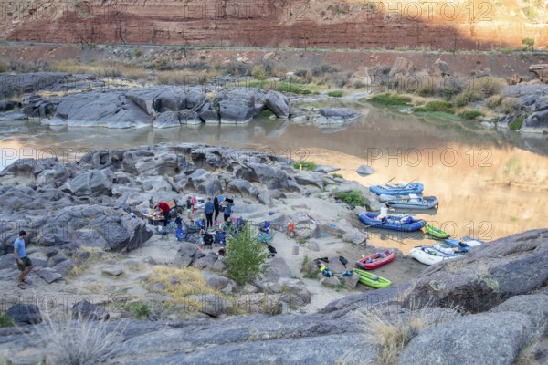 Loma, Colorado - Many children are part of a river rafting group camped in Ruby Canyon along the Colorado River