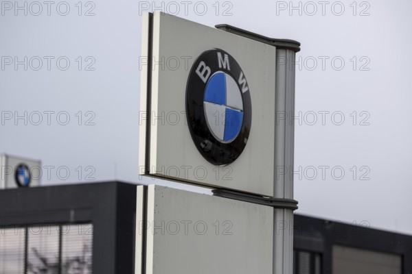 BMW sign on a car dealership