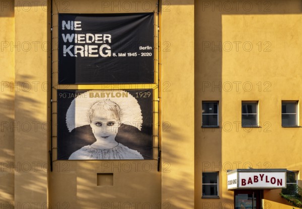 Film posters at the cult cinema Babylon on Rosa Luxemburg Platz, arthouse cinema opened in 1929, some of whose films are accompanied by a live orchestra, Berlin, Germany