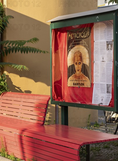 Film posters at the cult cinema Babylon on Rosa Luxemburg Platz, arthouse cinema opened in 1929, some of whose films are accompanied by a live orchestra, Berlin, Germany