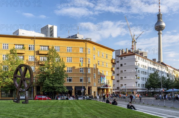 The Robber Wheel, metal sculpture and logo of Volksbühen Berlin, made in 1994 by Swiss sculptor Rainer Haußmann, Rosa Luxemburg Platz, Berlin, Germany