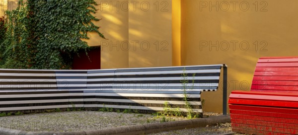 Wooden seating area at Kultkino Babylon on Rosa Luxemburg Platz, arthouse cinema opened in 1929, some of whose films are accompanied by a live orchestra, Berlin, Germany
