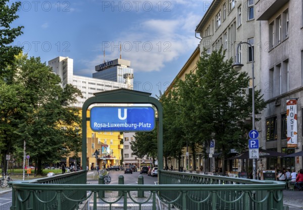 Rosa Luxemburg Platz subway exit with the Park Inn at Alexanderplatz in the background, Berlin, Germany