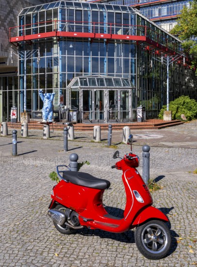 Red Vespa parked in front of the entrance to the Einstein Center for Mathematics building at the Technical University of Berlin on Straße des 17. Juni, Berlin, Germany